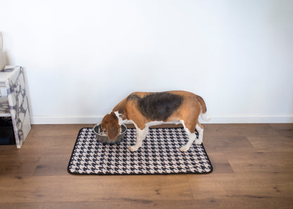 dog using a washable training pad at home